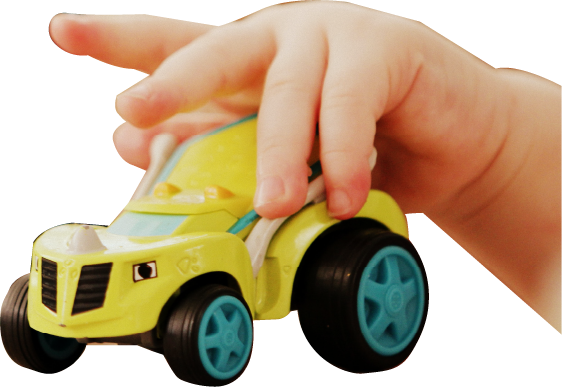 Child hands on yellow truck